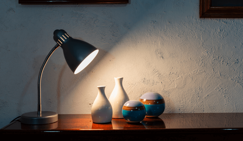 Como a iluminação pode criar uma atmosfera acolhedora