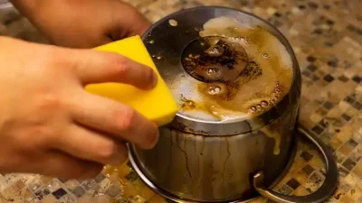 como limpar panela de inox manchada