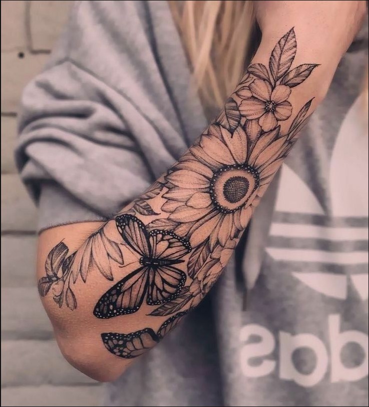 Flores No Braço Tatuagem Feminina