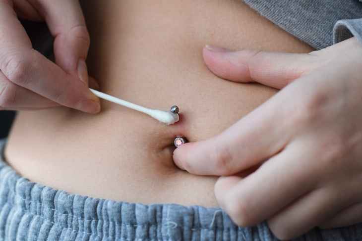 cuidados com piercing no umbigo após cicatrização