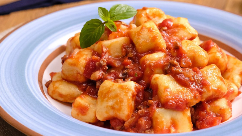 custo médio de um jantar com pratos que começam com n