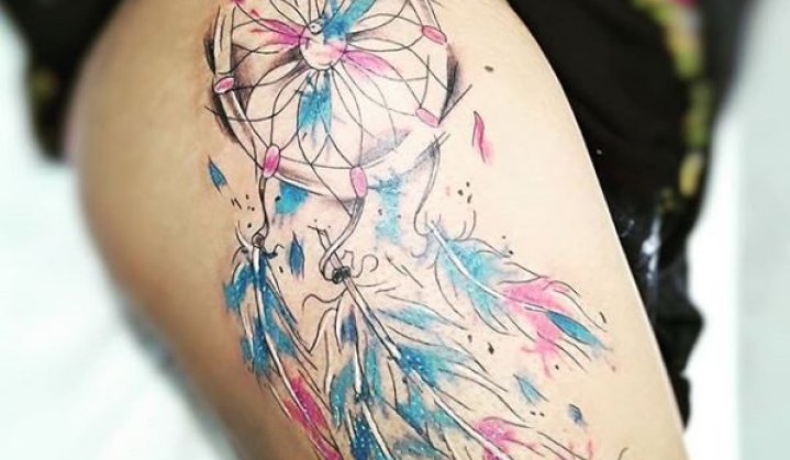 sonhar fazendo tatuagem no braço esquerdo