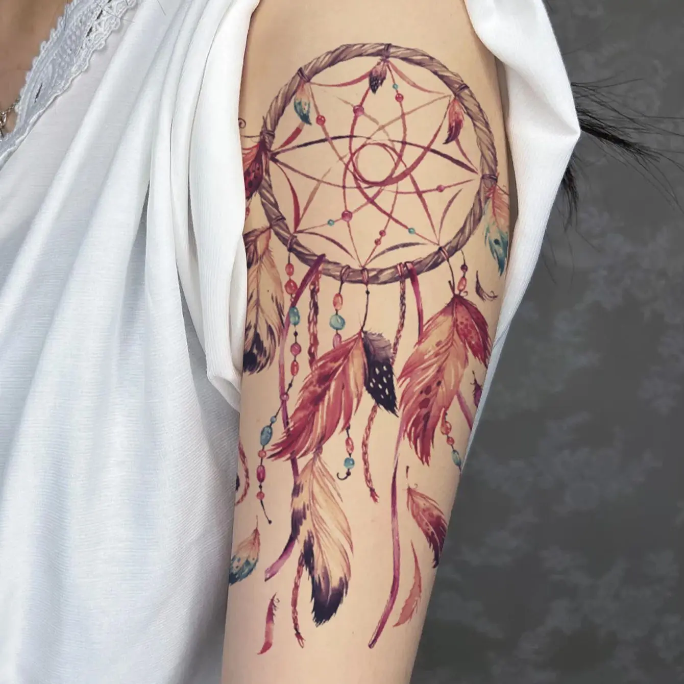 sonhar que outra pessoa faz tatuagem no meu braço