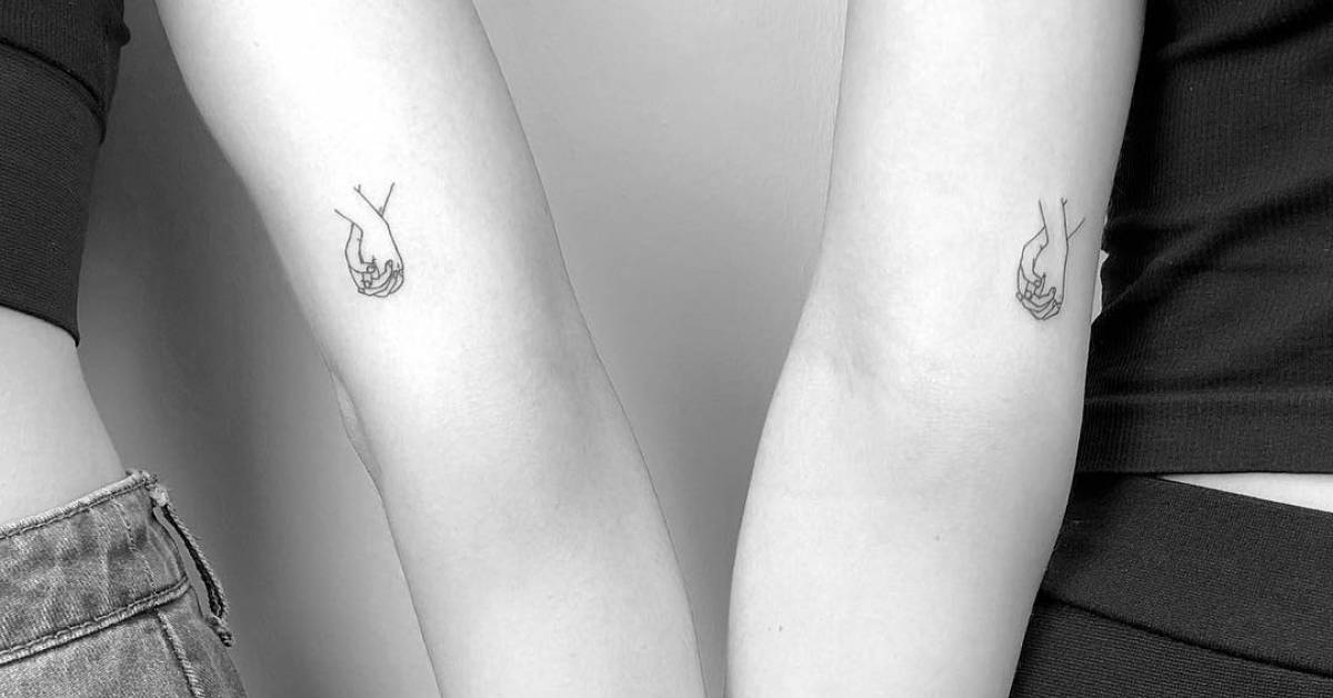 tatuagem de amiga com símbolo do infinito