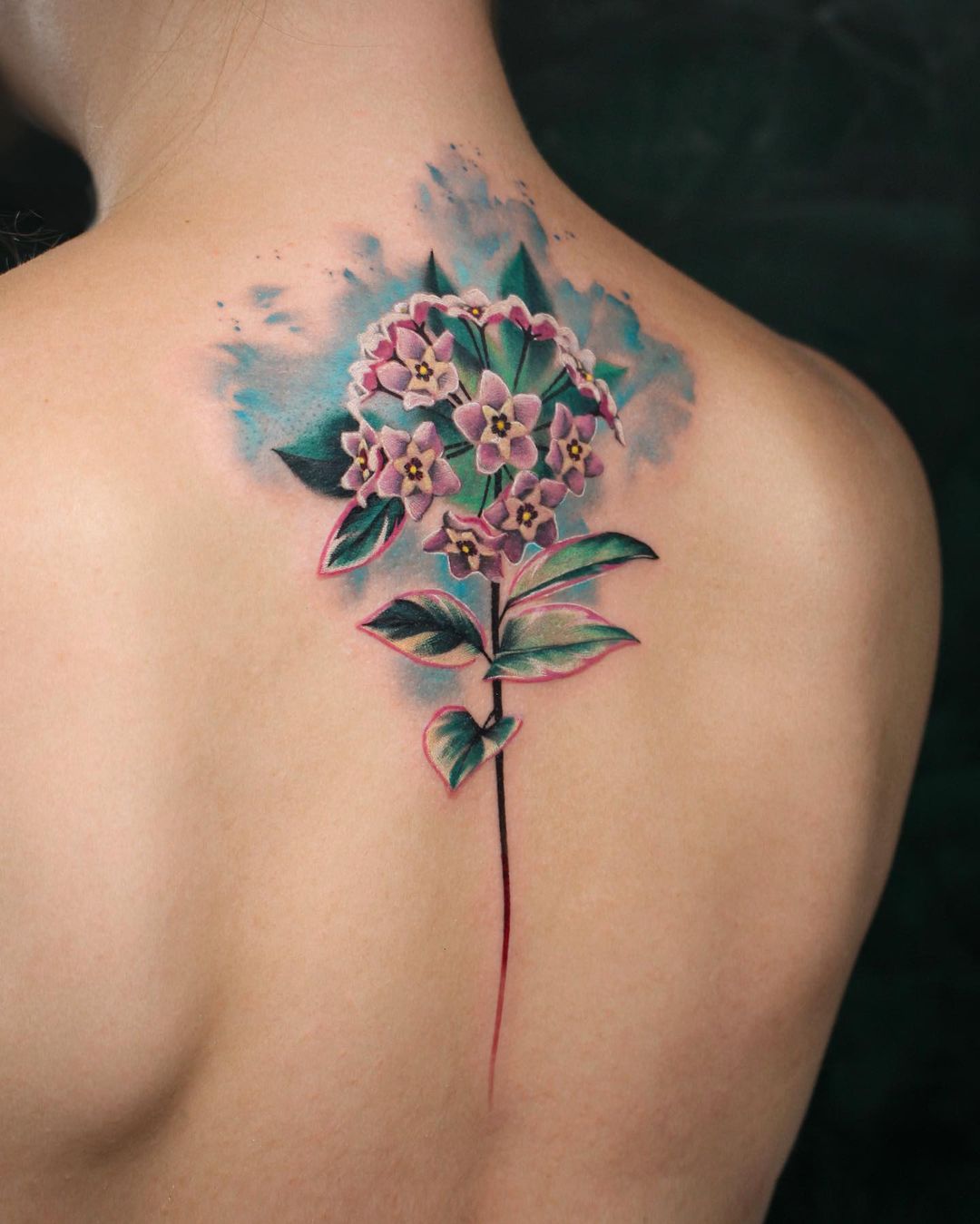 significado tatuagem flor delicada