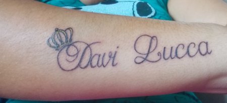 tatuagem nome filho costela