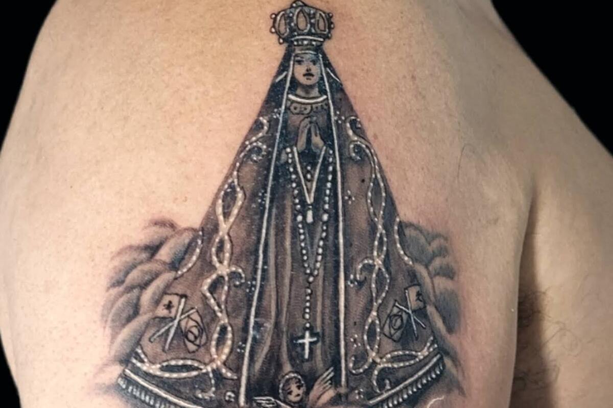 tatuagem nossa senhora braço