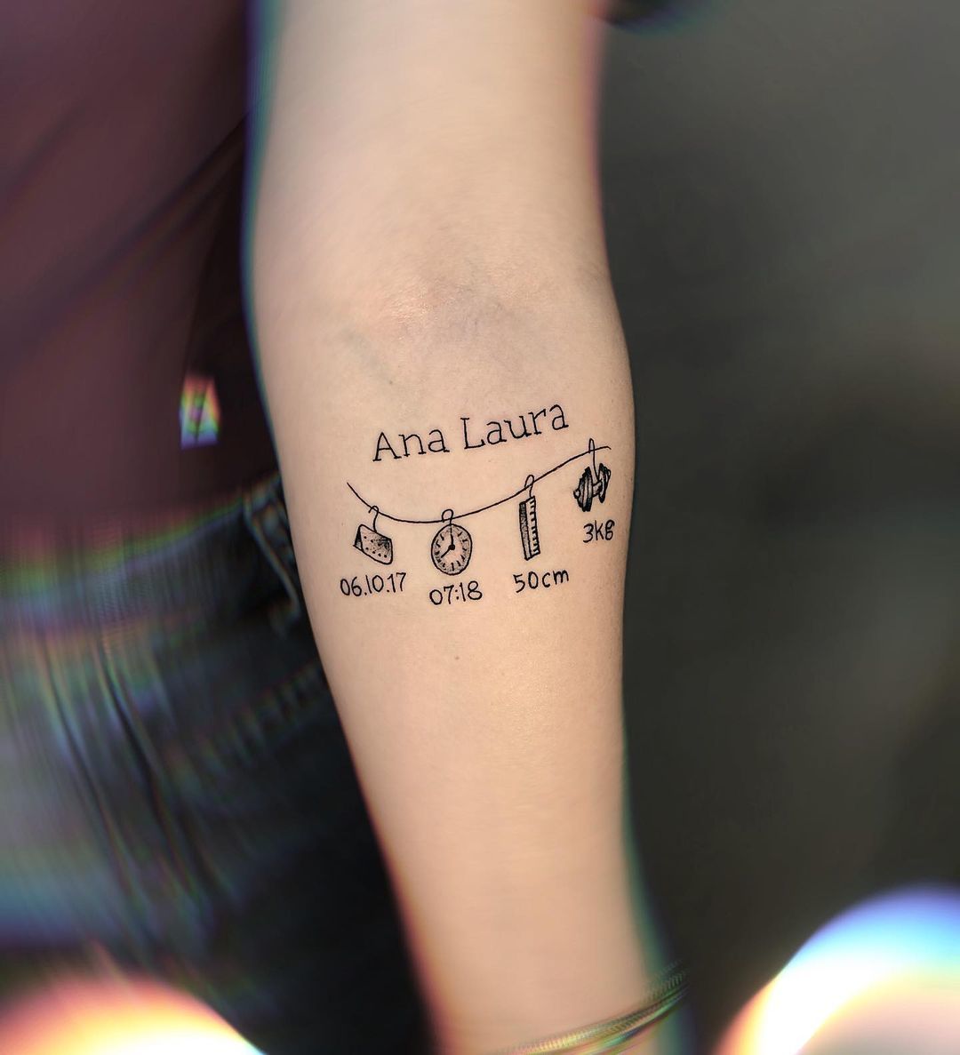 tatuagem nome filho vs símbolo no braço