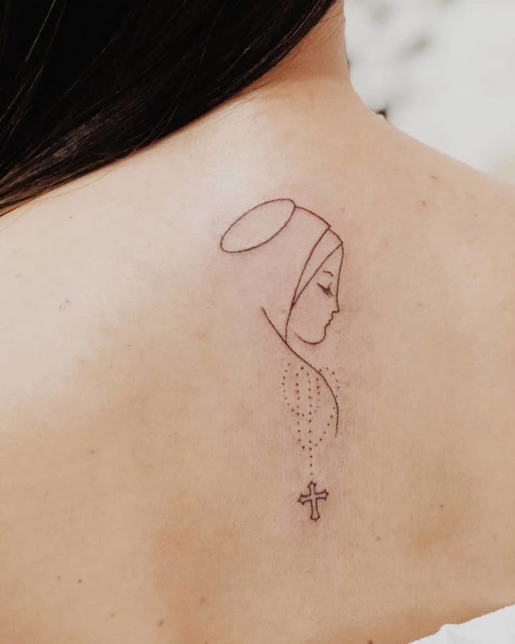 tatuagem feminina nossa senhora aparecida