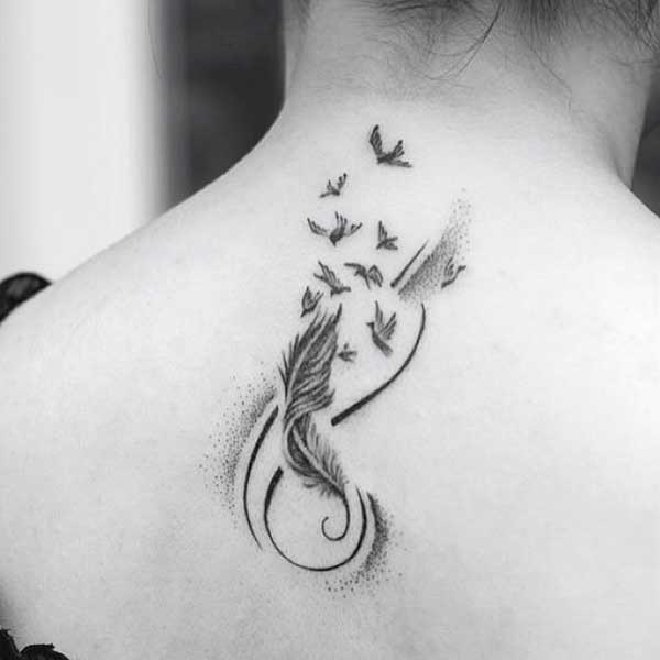 tatuagem de dente de leão com sementes ao vento