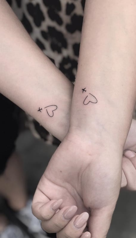 tatuagem de amizade com animais