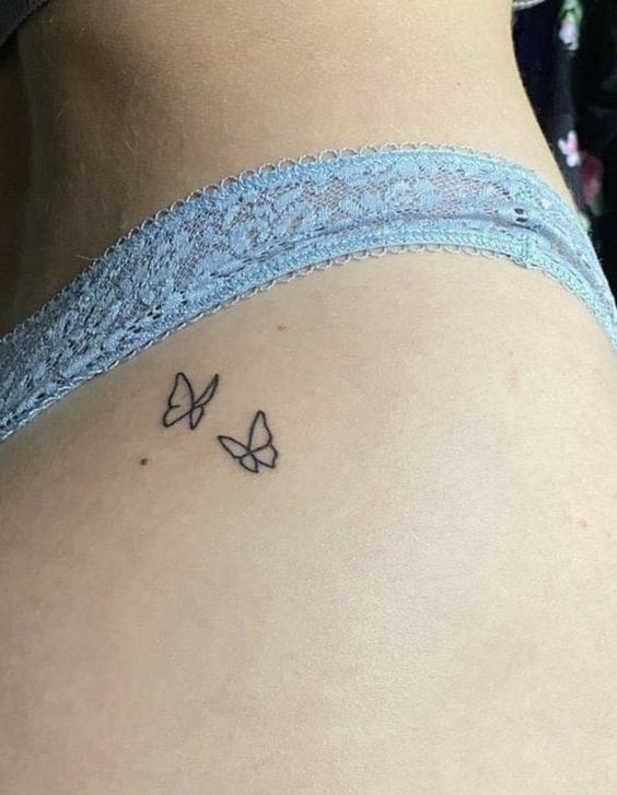 tatuagem minimalista 777 no glúteo significado