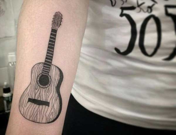tatuagem instrumento musical