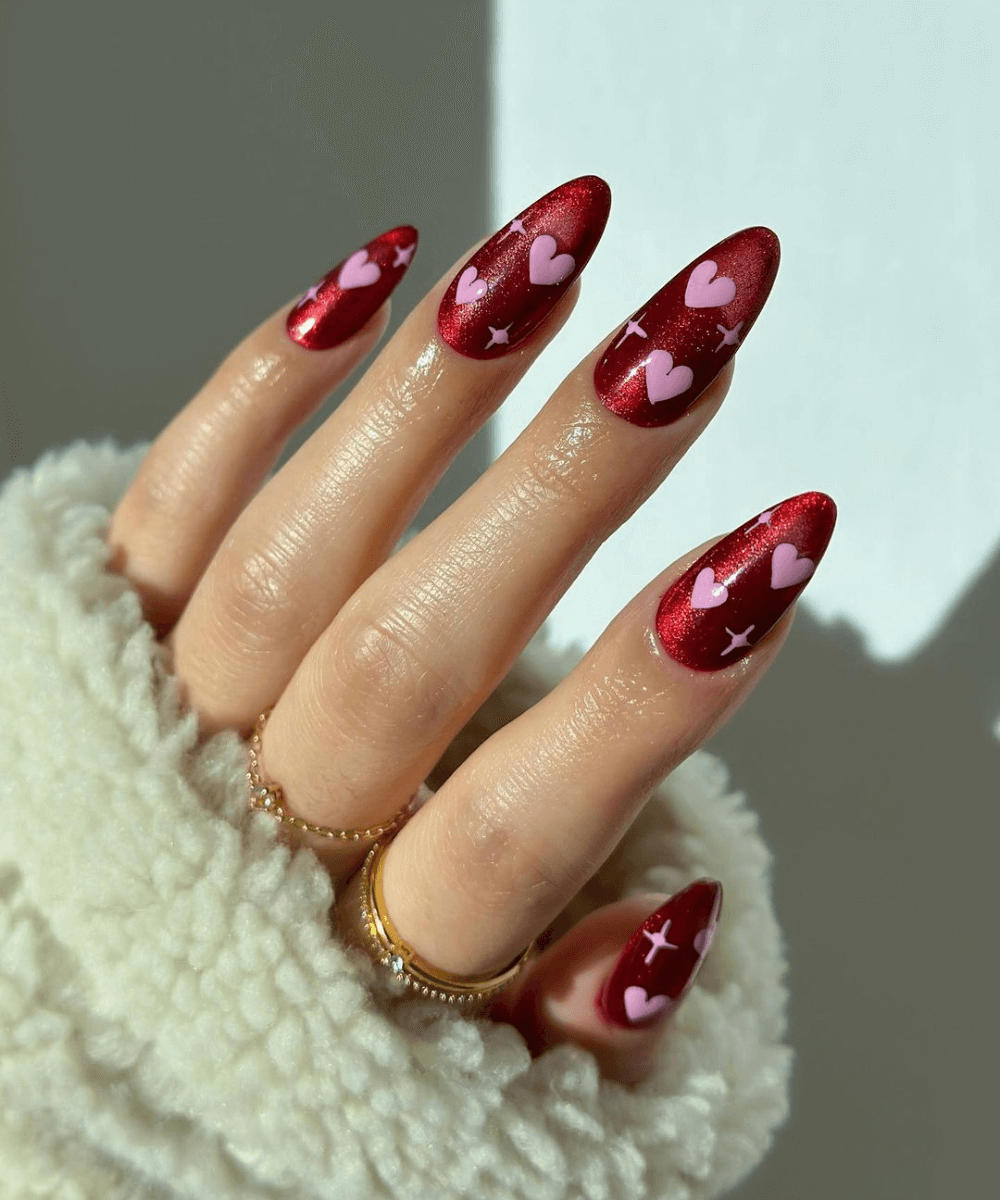 unhas vermelhas com glitter e desenhos