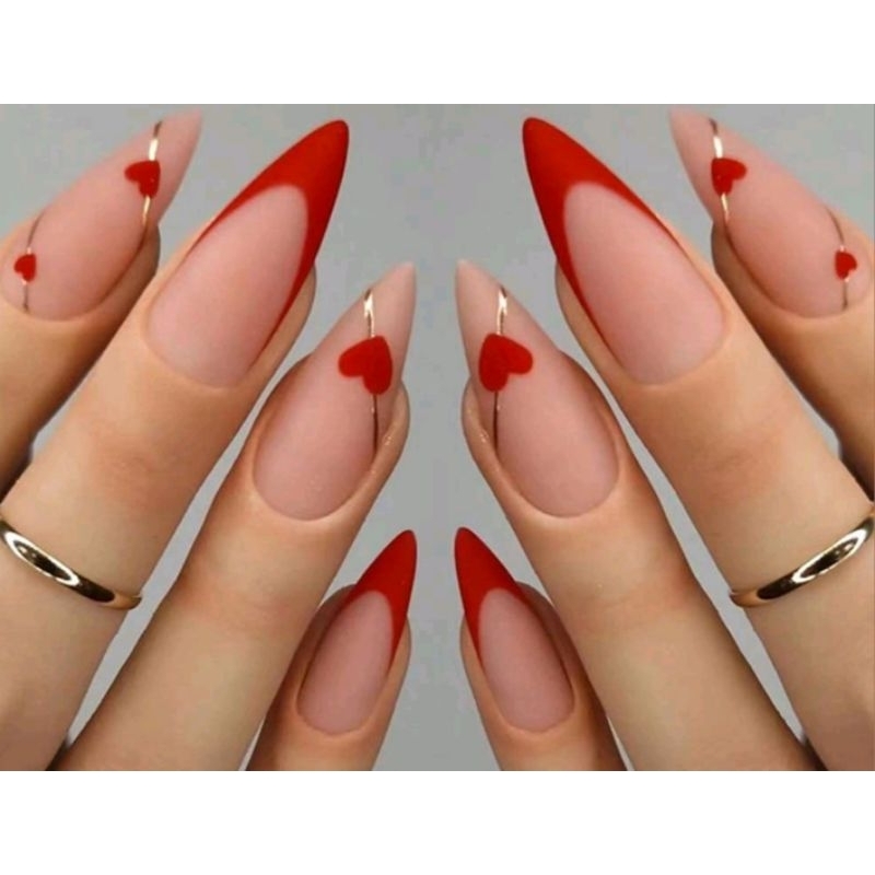 unhas vermelhas com francesinha em V