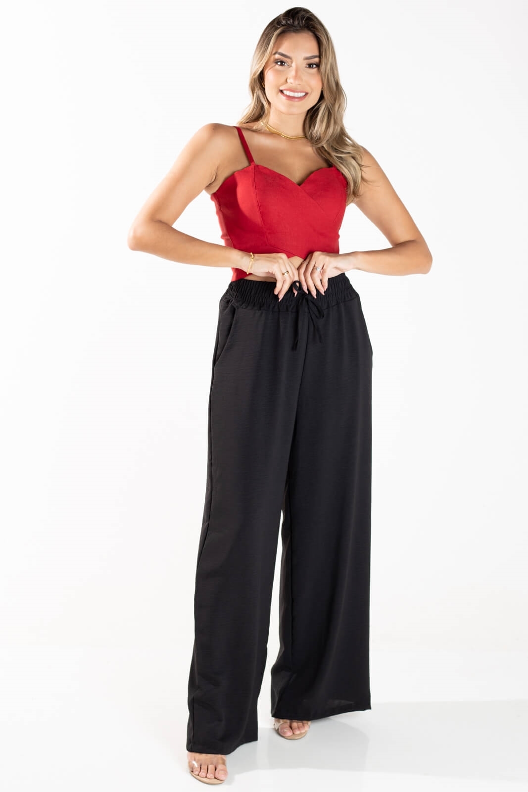 calça preta justa que não marca a barriga