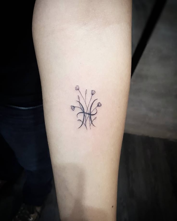 tatuagem peixes feminina 2026